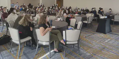 Audience members of the dashboard workshop at NPA 2024. (Faces blurred to protect attendee privacy.)